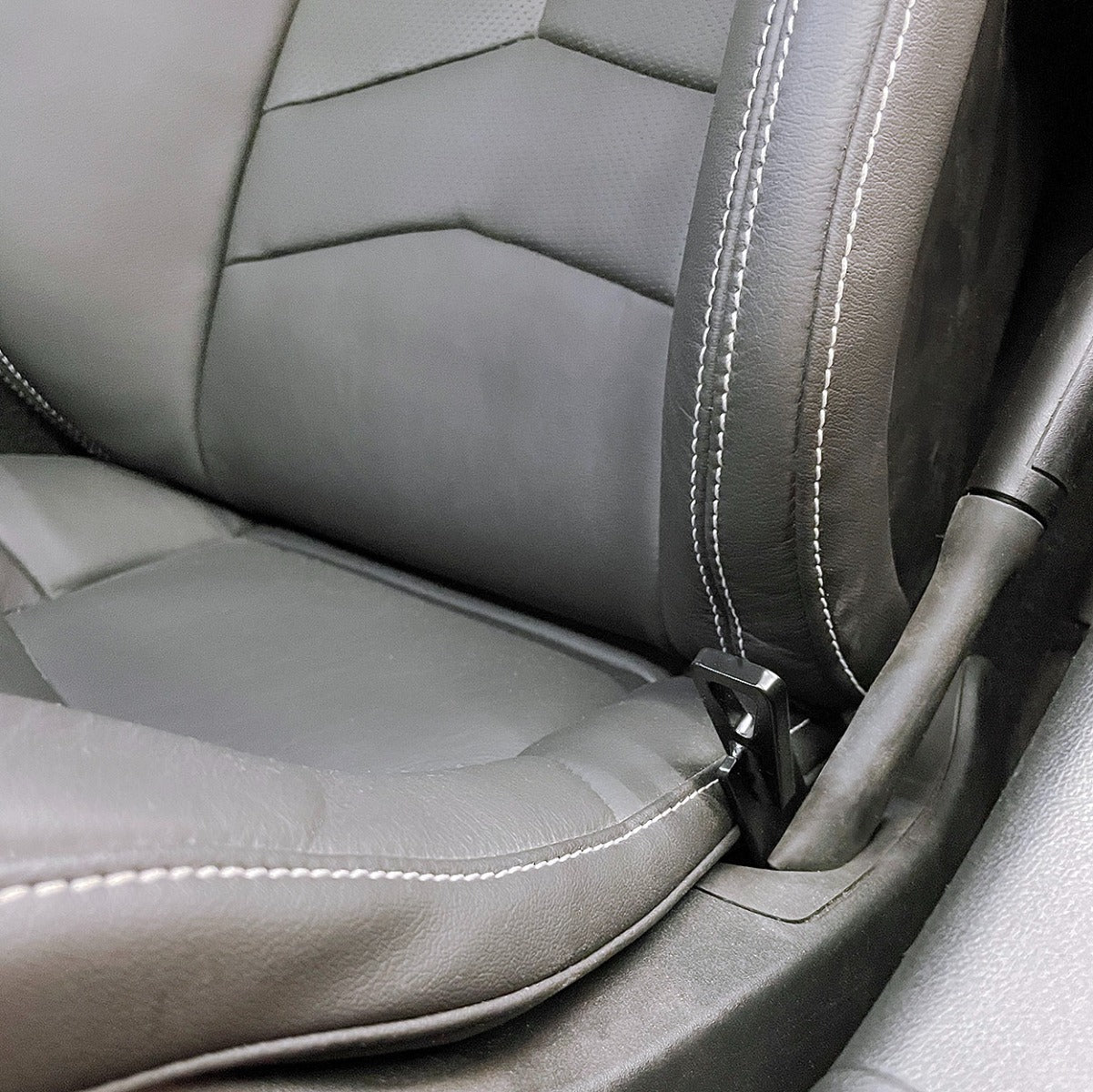 Use racing harnesses with the factory seats in the C8 Chevy Corvette made easy and cheap by Competition Motorsport.